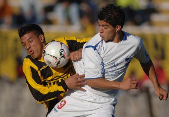 LPL猜输赢-时隔16年重返 苏亚雷斯在乌拉圭民族只待3个月